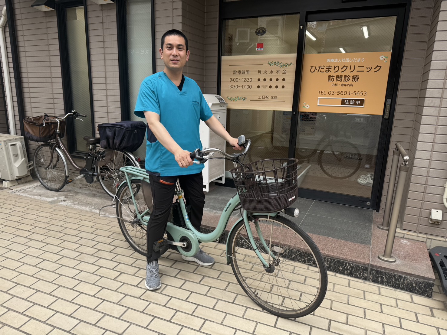 院長と自転車1